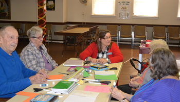 Senior residents engaged in social activity.