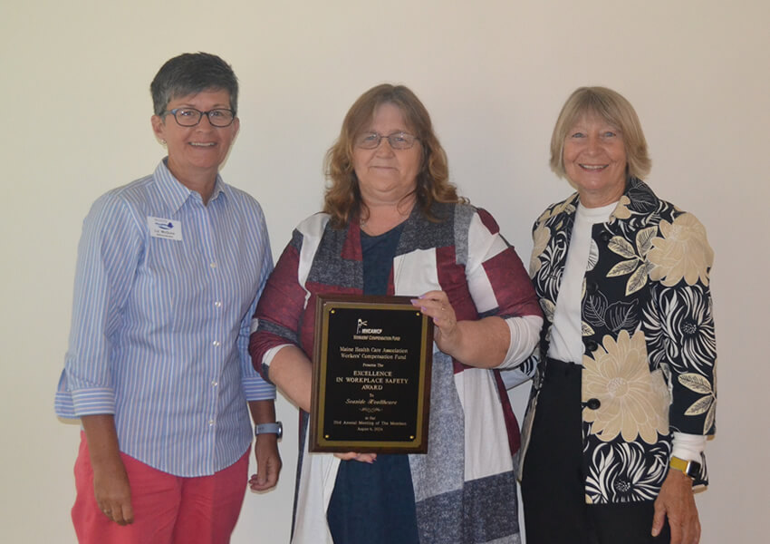 Seaside Healthcare receiving the 2024 Excellence in Workplace Safety award.